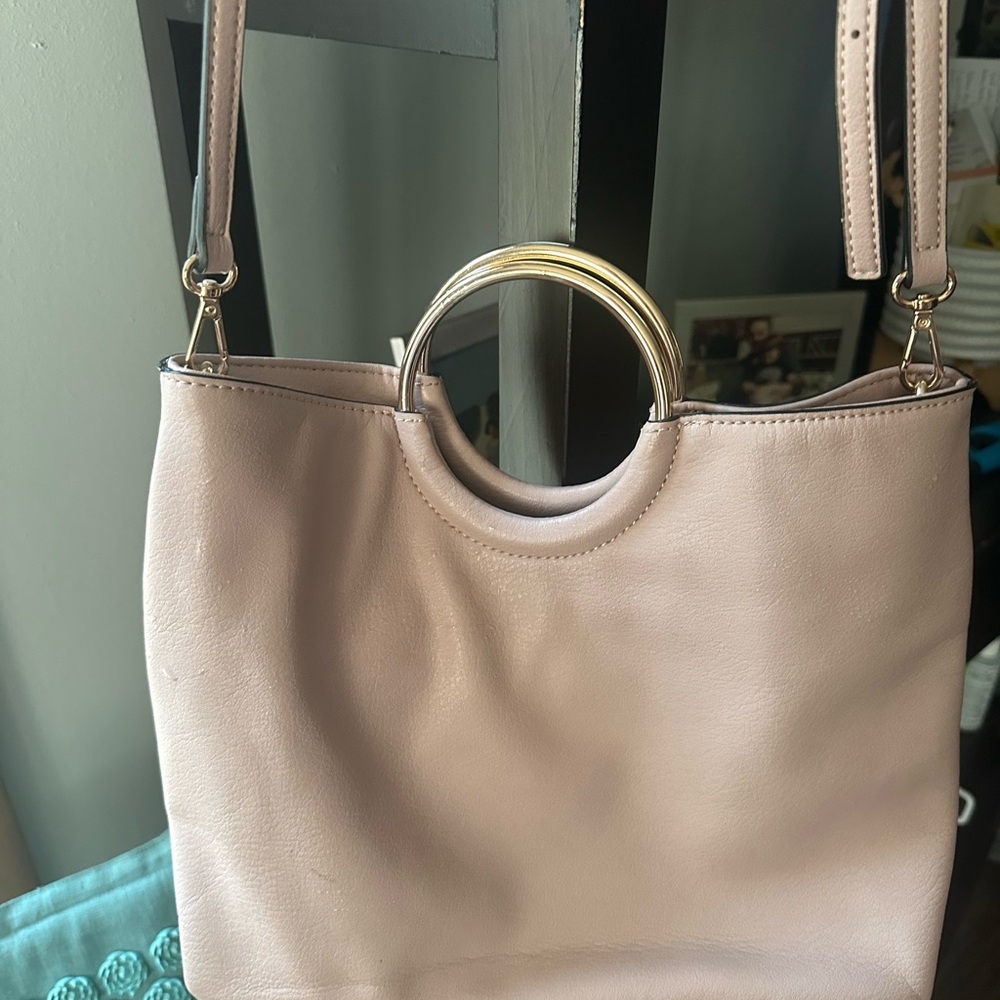 Elegant Pink Handbag with Gold Accents